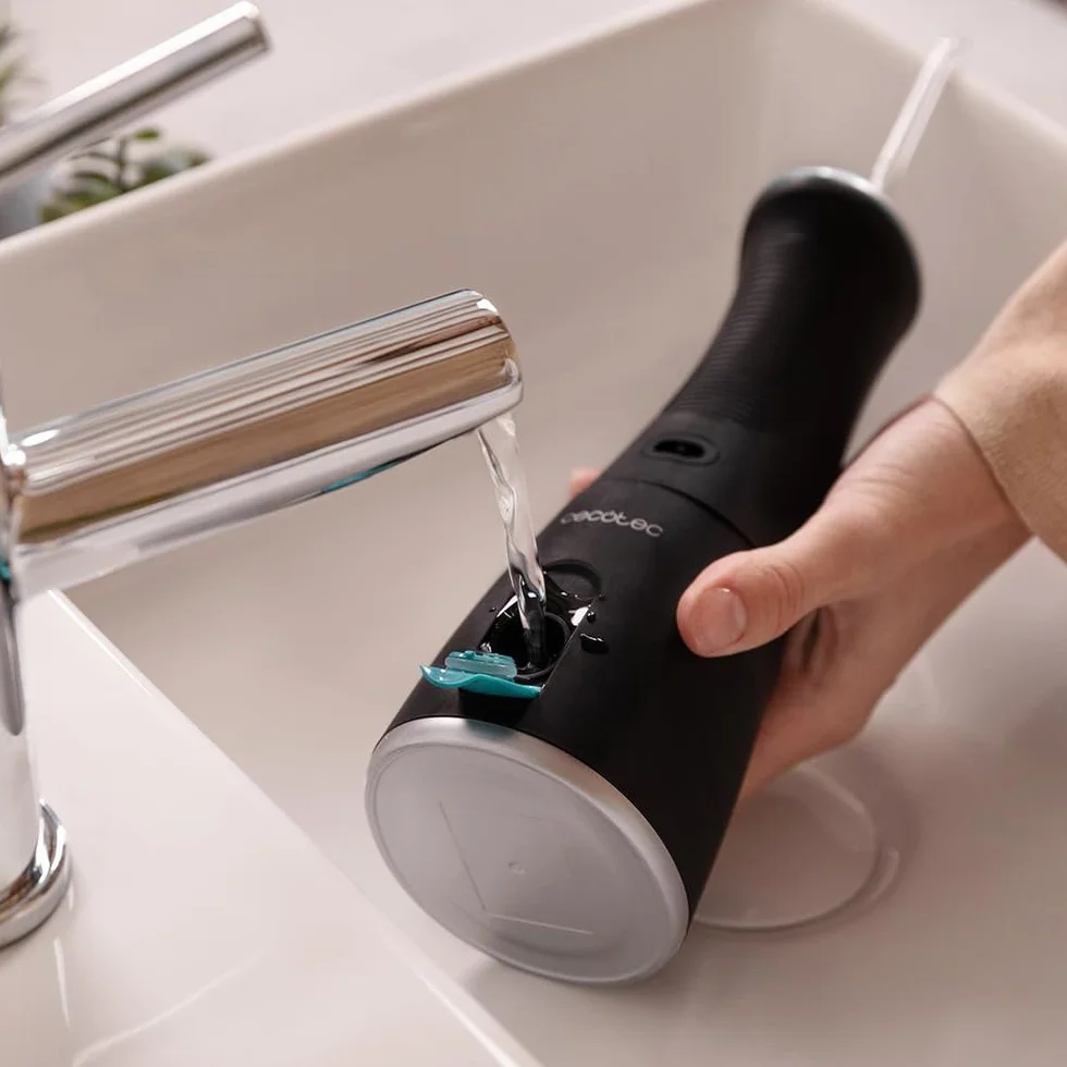 Cecotec Irrigateur de Voyage Compact et Léger ToothCare 1100 Jet Clean Liberty. Irrigateur Dentaire Portable avec 6 Modes, 8 Réglages de Pression, Capacité 280ml, IPX7, Inclut 8 Buses, Recharge USB