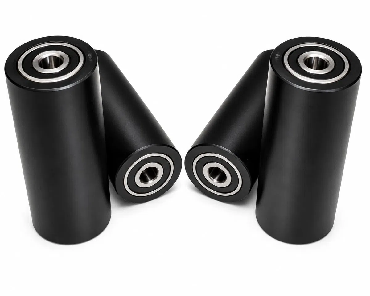 Lot de 4 rouleaux en nylon polyamide, 40 mm de diamètre, 100 mm de largeur, roulements de 10 mm, usiné avec précision dans l'UE (40-100-10, noir)